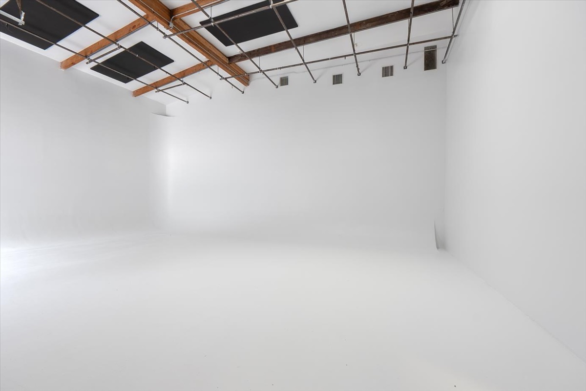 White cyc wall stage under skylights at Dream Magic Studios